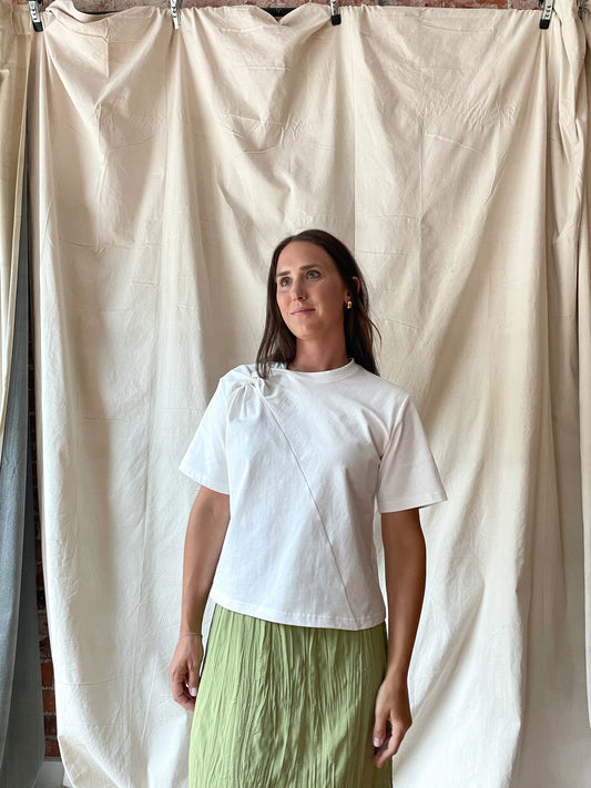 Elevated white t-shirt with twist detail at neckline 